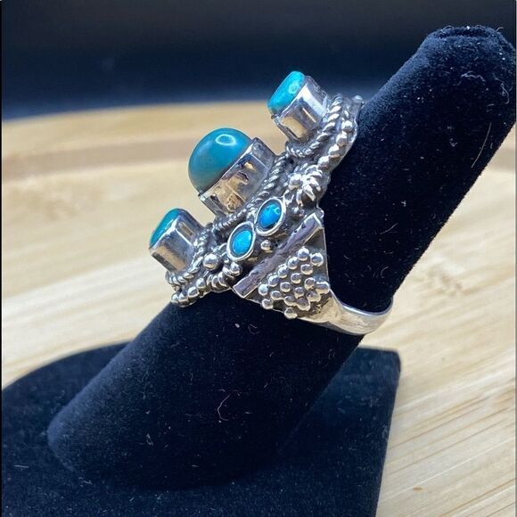 925 silver 7 stone turquoise ring w/3 oval stones approx 8x5mm and 4 round 3mm - Picture 6 of 7